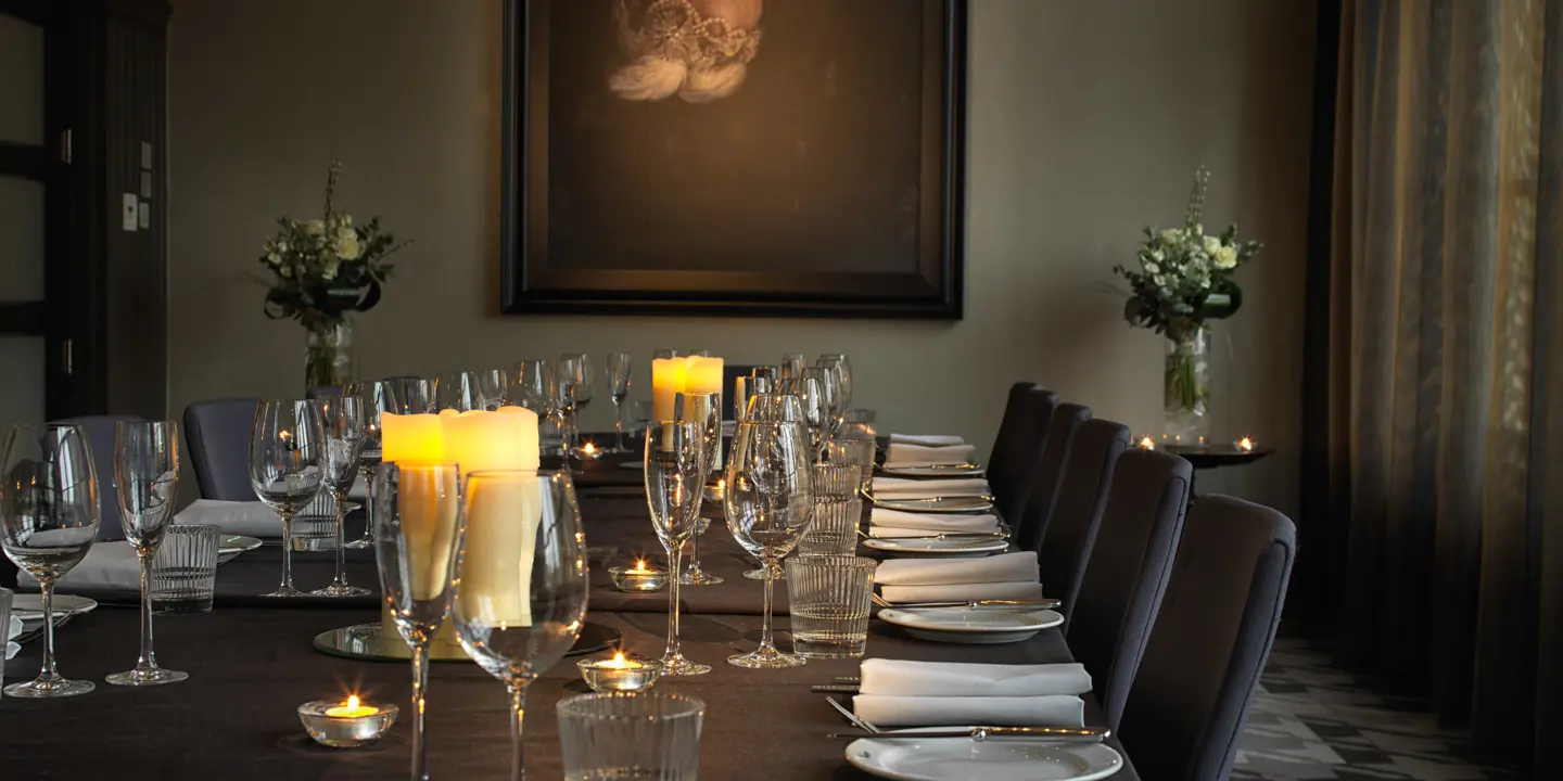 A table adorned with neatly arranged place settings.