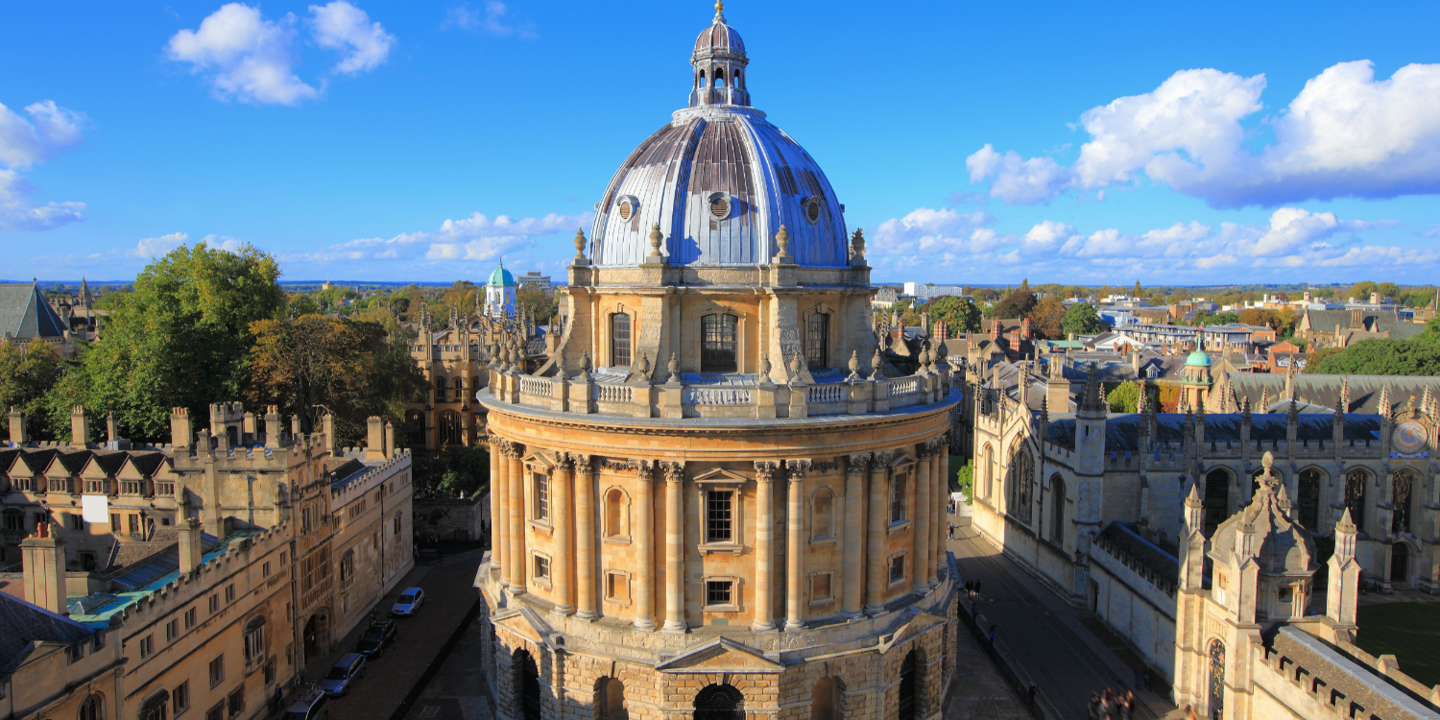 A grand architectural structure featuring a majestic dome atop.