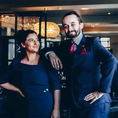 Man leaning on lady