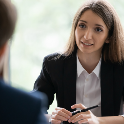 Woman speaking to man