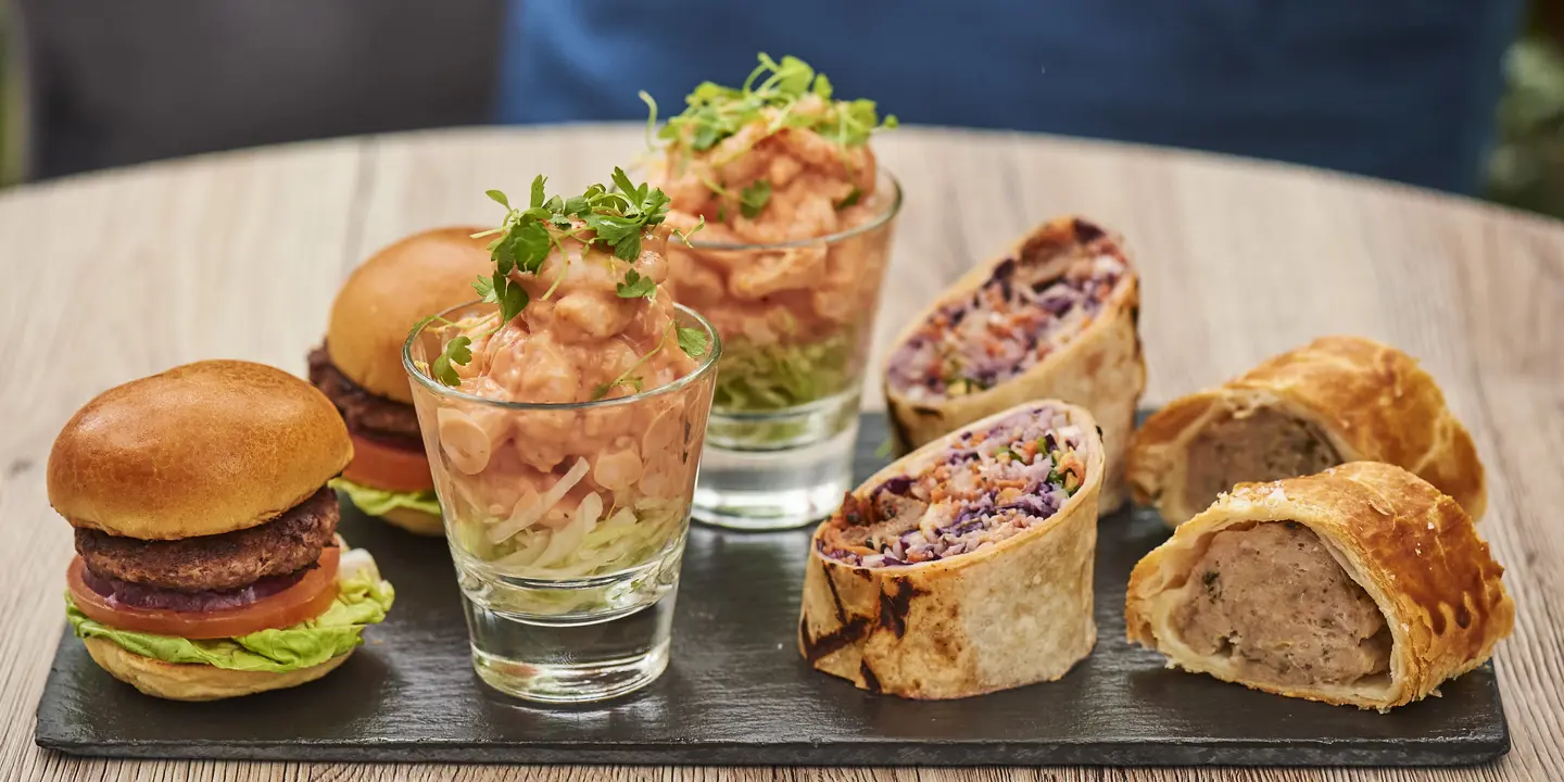 A plate of food featuring different sandwich types.